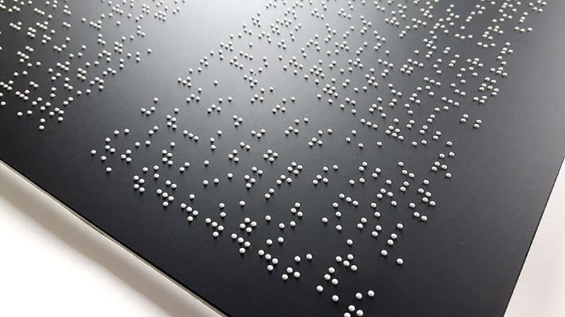 Señalización en braille para invidentes